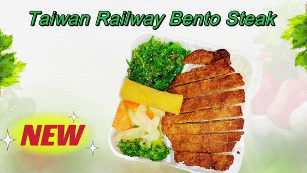 Taiwan Railway Bento is made of fried railway vegan pork ribs served with rice, super greens, seaweed salad and one spring roll.