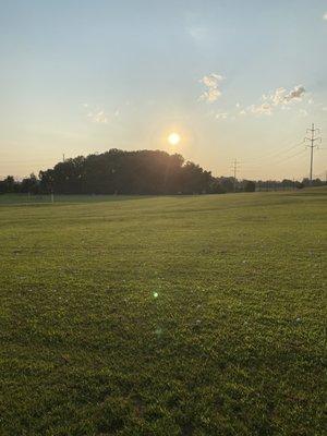 Nearing sunset view of driving range