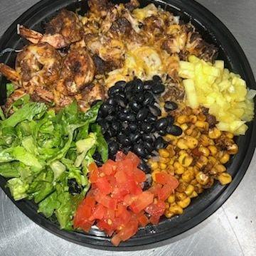 Famous jerk Chipotle bowl comes with smokes cron,black beans,lettuce, diced tomatoes,diced pineapple and cheese