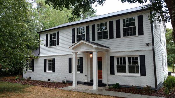 House in Historic District gets new windows.