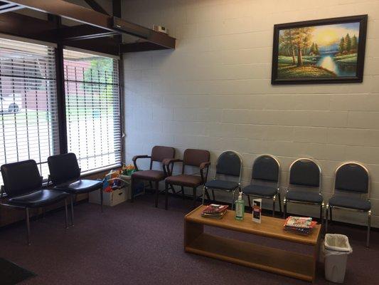 The ERGA waiting room, including a children's play area.