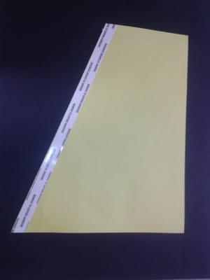 Wondering how we got double-sided tape put diagonally on a sheet of paper? Two words: Trade secret!...