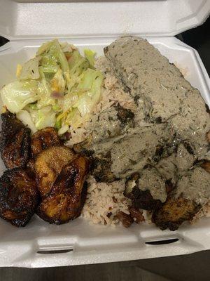 Jerk salmon and jerk chicken with jerk sauce rice and peas cabbage fried plantain