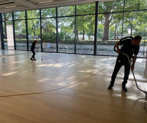 Members of our staff cleaning before a museum grand opening in Oklahoma.