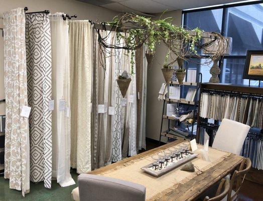 We also sell pre-made drapes. We have many different options in stock.