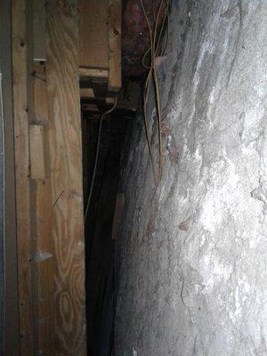 Large bow in basement wall.