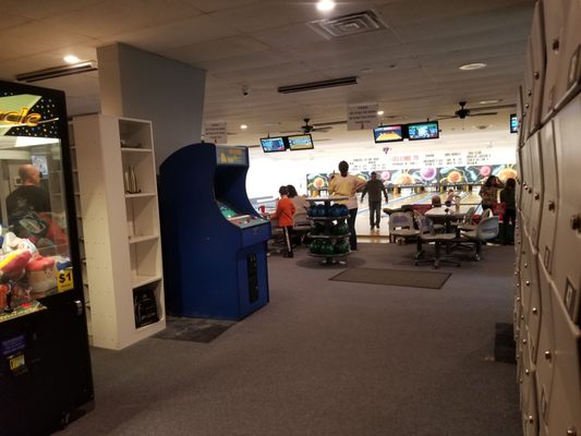 A couple of arcade games and lockers