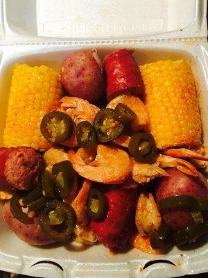 Spicy boiled shrimp W/ sausage, corn and potatoes