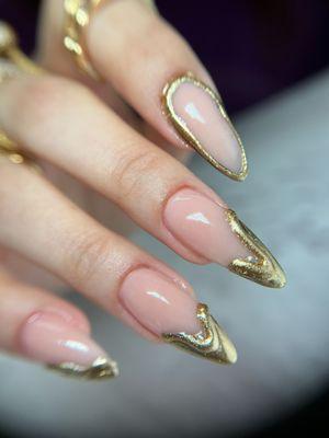 Beautiful Gold dripped acrylic nails.