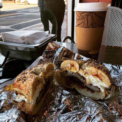 Everything bagel with bacon, sausage, pepper jack cheese and scrambled eggs. Coffee!