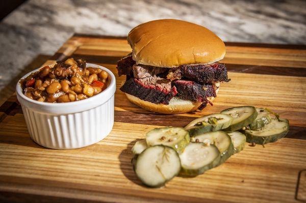 Texas style brisket sandwich with BBQ smoked beans