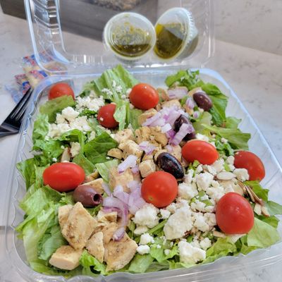 Authentic, fresh Mediterranean Salad w/grilled chicken breast bite! Choice of 4 dressings.