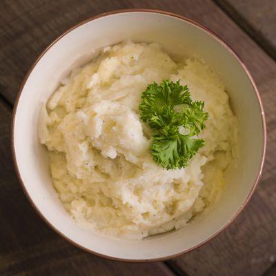 Mashed Potatoes (Vegetarian)
 
 Boiled red-skinned potatoes lightly whipped with whole milk and butter. Seasoned with salt and black pepper.