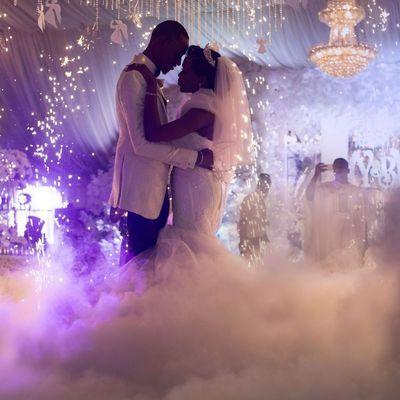 Bride & Groom dancing on the clouds