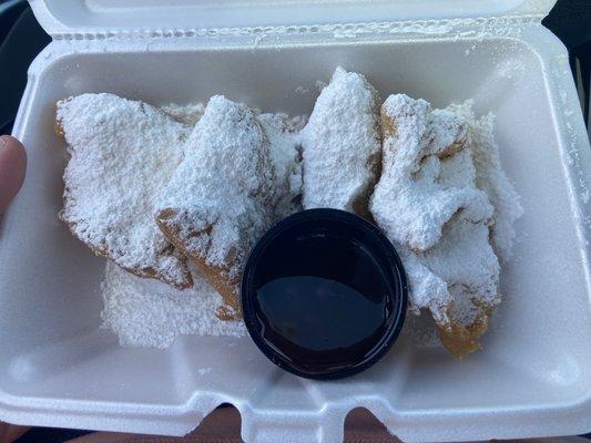 Traditional beignets with chocolate sauce