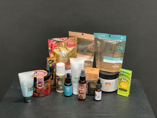 Variety of CBD essentials, including vapes, gummies, creams, and tinctures.