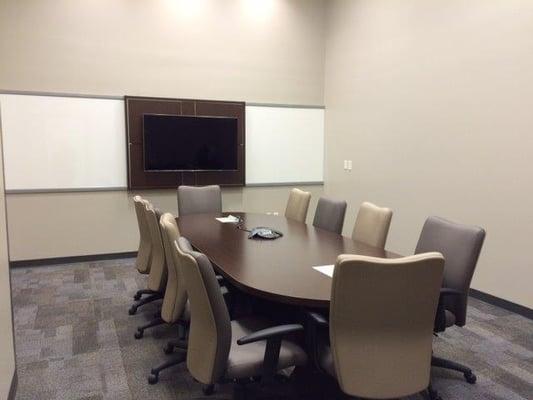 This is our conference room Charlie. Ideal for depositions. $69/Hour. Contact Sandy McLain for more information.