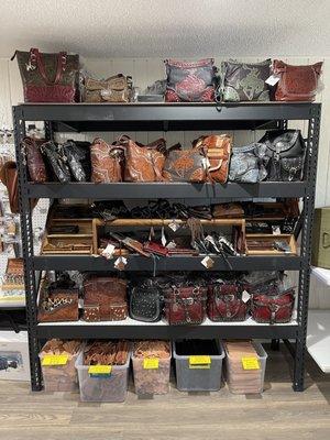 We have a good selection of American West handbags.  The tooling is done by hand.  Below you can see leather cutouts for your projects.