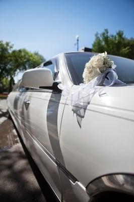 White limousine for your wedding day provided by Durham's best limo service.