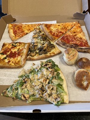 Chicken Caesar salad slice, chicken Marsala slice, grandma slice, some plain slices and garlic knots. Yummmmmy!