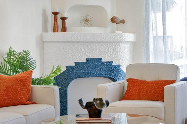 Spanish style home for sale with colorful staging.