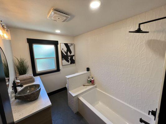 Beautiful remodel bathroom on the main level of a 1940's original home in the heart of Midtown Bend Oregon. We combined custom cabinets