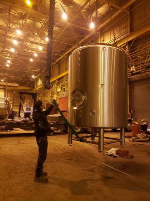 Steel brewing beer hopper rigging done by Equip Trucking and Warehousing