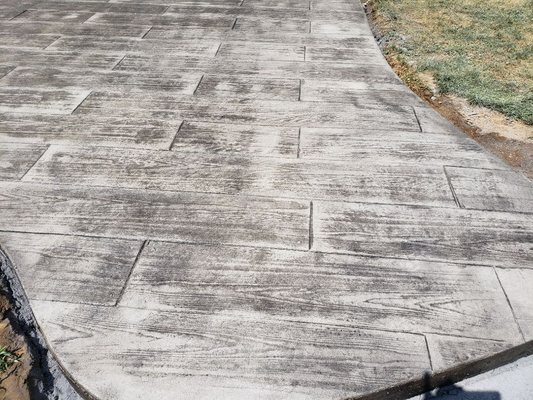 Increte Stamped Concrete Wood Plank Pattern..Color Pewter with a dark gray..