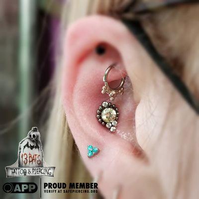 Conch and rook piercings