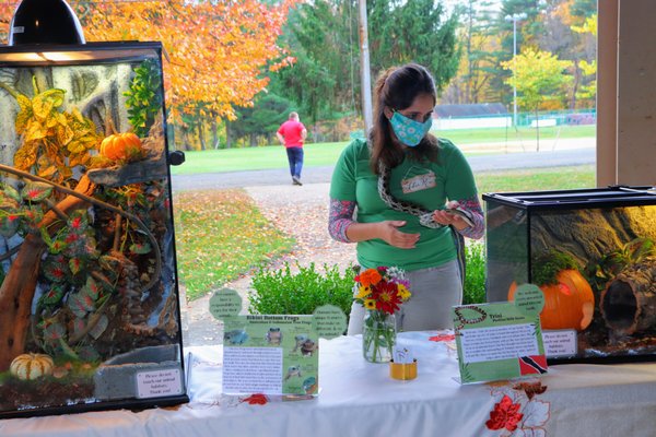 Our Director, Tina, introducing our beloved snake, Gucci, during one of our public programs