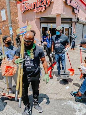 Church volunteers helping to clean up West Philly after the violent protests.