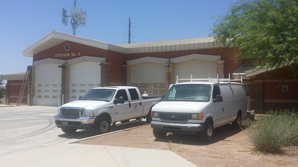 One of our trucks and Vans painting the doors of Gilbert's Fire Stations # 5