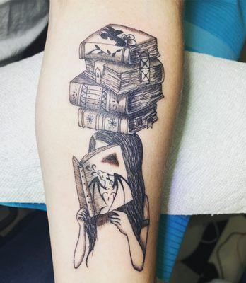 Book reader tattoo