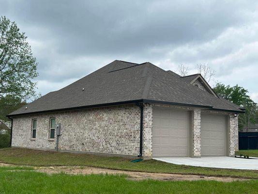 Garage Door & Black Gutter installation