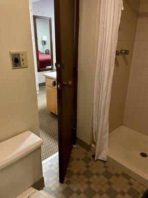 The bathroom that you share with the other room