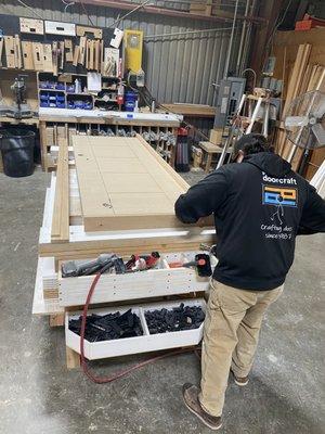 Beautiful quarter-sawn white oak panel door with etched ladder pattern on the nail up table.