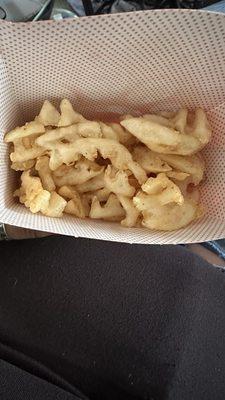 More crumbs and scraps of fries instead of actual waffle fries