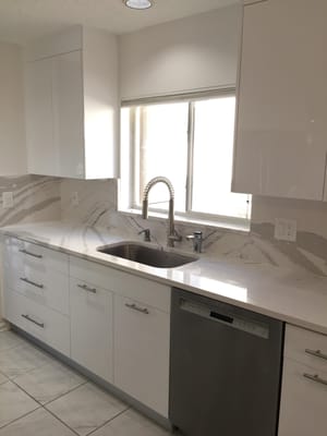 European style kitchen in glossy white