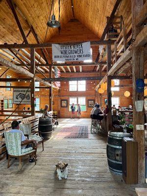 The inside of this awesome location, complete with canine winery mascot welcoming guests.