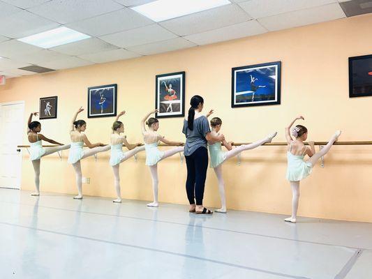 Students of Almayeva Ballet Academy working at the ballet bar