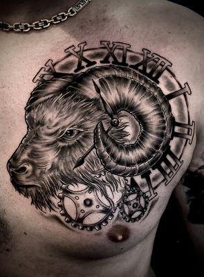 Custom ram with clock and gear background. Tattoo by Jayse... wed-sat