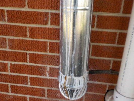 This gas flue shows evidence of condensation.