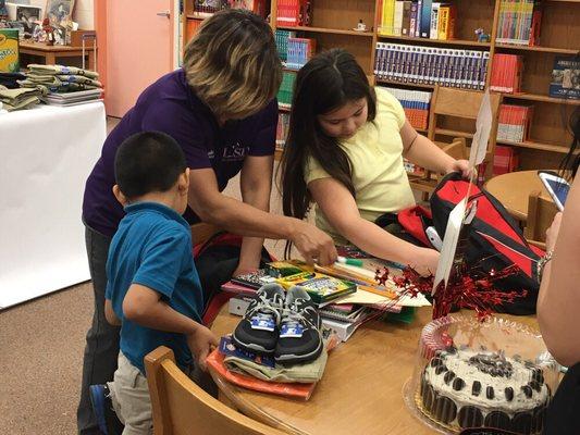 Students looking through their Backpacks.