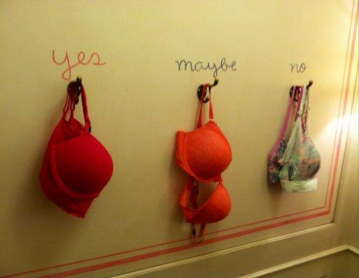 Cute signs on the Pink fitting room side for deciding on your choices.