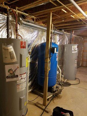 Customer very happy with the two water heaters and pressure tank that we installed.