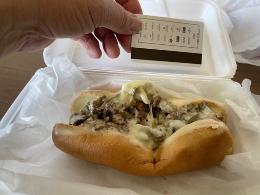 The $10 "Cheesesteak" with a room key for scale.