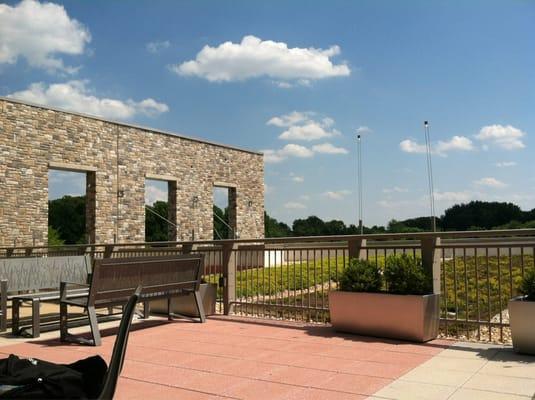 2nd floor... Outdoor sitting areas and 3 round tables; nice when the AC is blasting too hard inside.