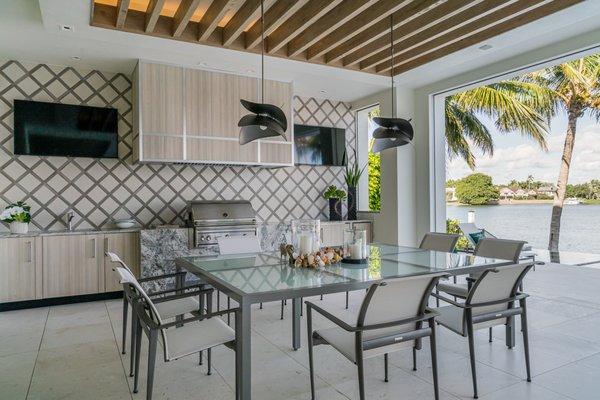 Outdoor kitchens are a must in Southwest Florida. Bring your home to the next level for year-round entertaining.