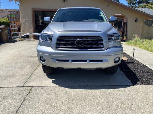 Front bumper, lower bumper valance , grill, lower light covers painted to match truck