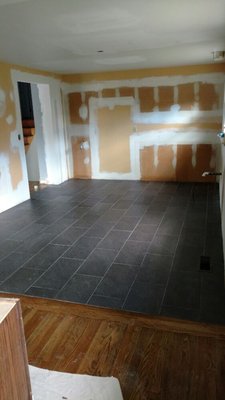 New tile floor in kitchen w/ drywall skim coat